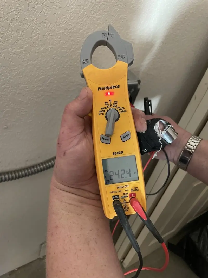 Voltage testing with clamp meter during Circuit Breaker Repair in Midvale